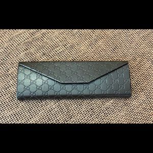 Gucci Brown Glass Case .